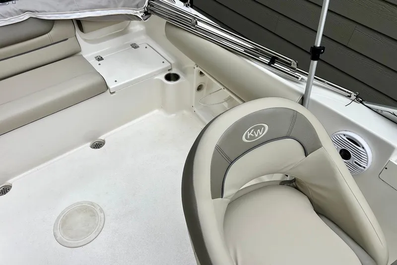 Slide: The Image of Interior of 2022 Key West 203 DFS boat, featuring seating and speaker. - 7