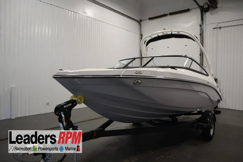 The Image of 2026 Yamaha Boats 195S in showroom, displayed on trailer, Leaders RPM logo visible. - 0