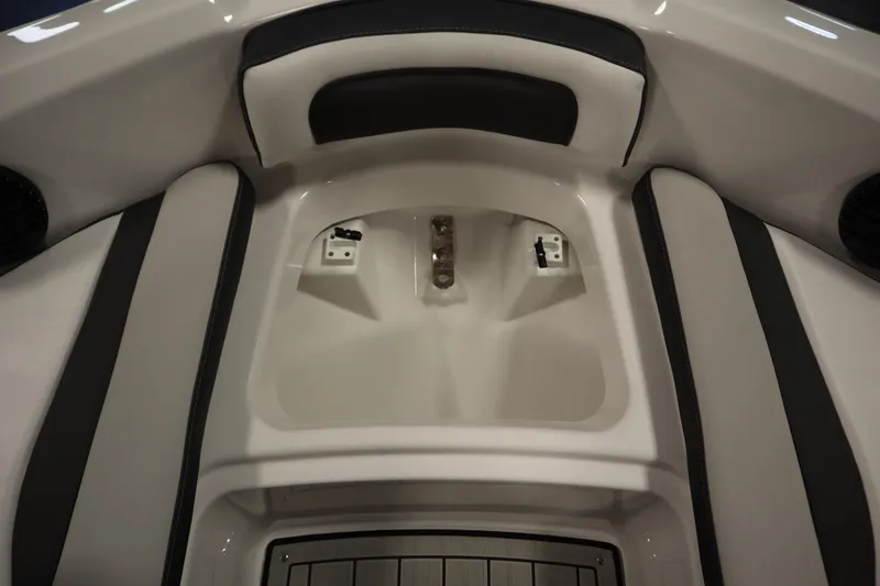 Slide: The Image of Interior view of 2026 Yamaha Boats 195S, featuring sleek seating and storage area. - 15