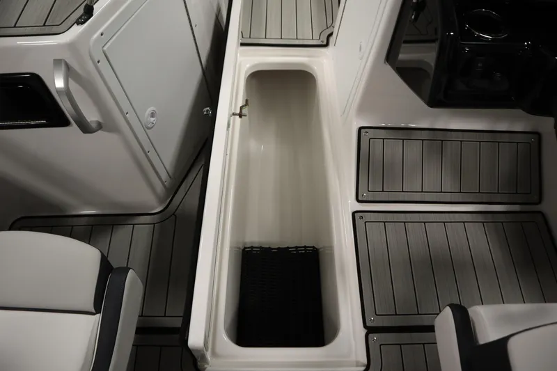 Slide: The Image of 2026 Yamaha Boats 195S interior storage compartment with sleek design and modern finishes. - 28
