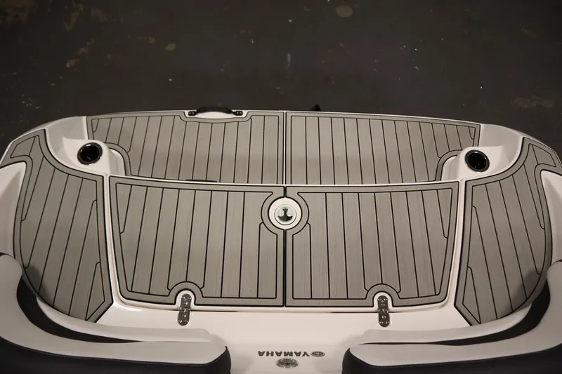 Slide: The Image of 2026 Yamaha Boats 195S swim platform with sleek, modern design and integrated cup holders. - 40