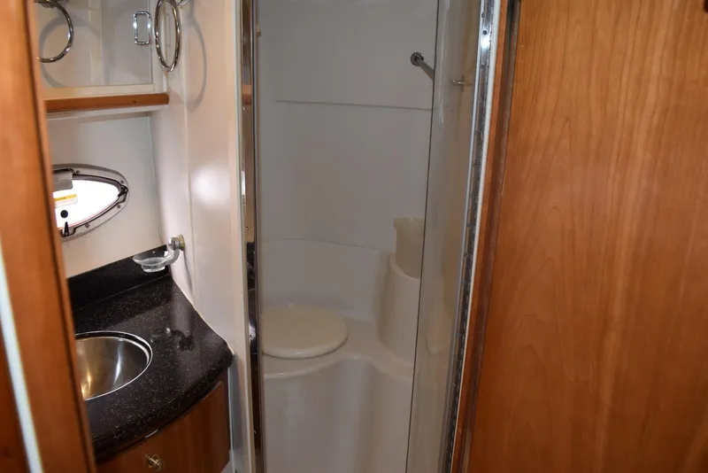 Slide: The Image of Bathroom interior of 2001 Carver 444 Cockpit Motor Yacht with sink and shower. - 30
