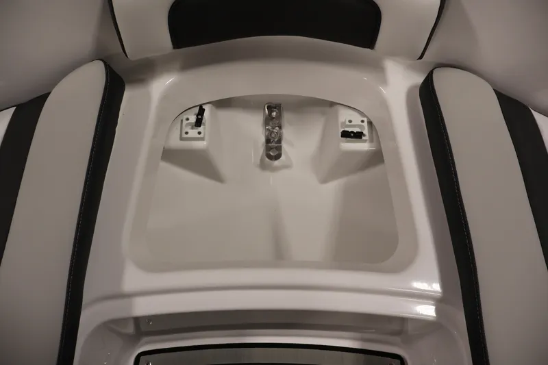 Slide: The Image of Interior view of 2026 Yamaha Boats 195S, showcasing sleek seating and storage design. - 11