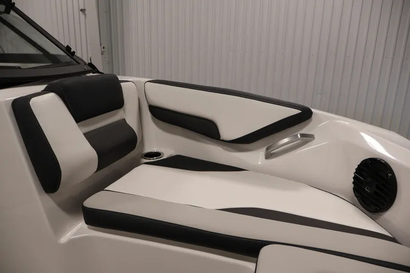 Slide: The Image of 2026 Yamaha Boats 195S interior seating with black and white upholstery. - 12