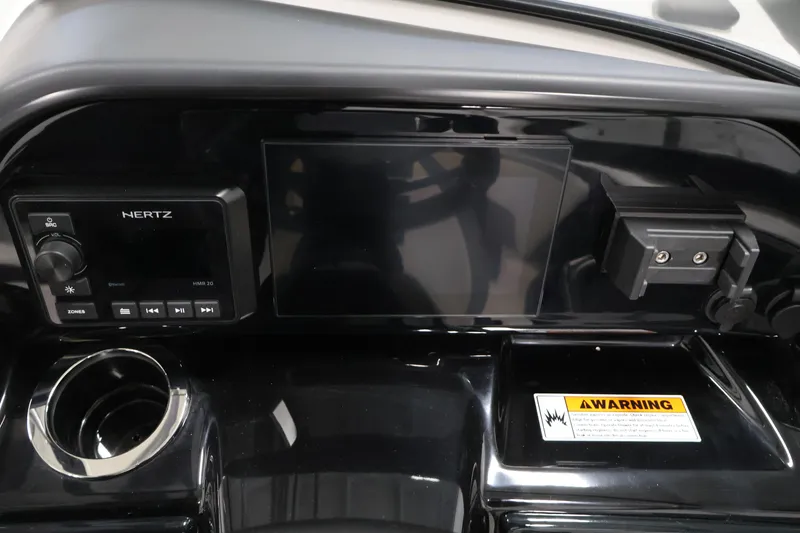 Slide: The Image of Dashboard of 2026 Yamaha Boats 195S with control panel and warning label. - 20