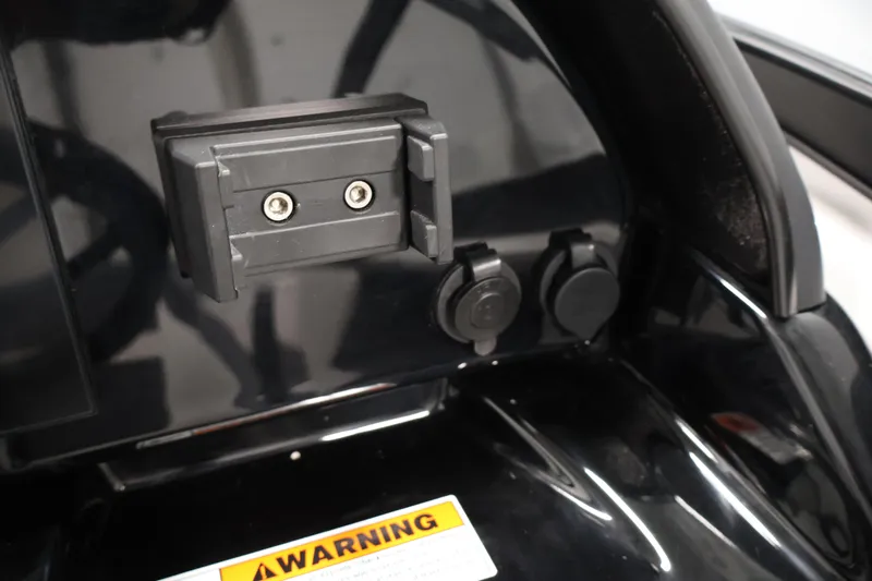 Slide: The Image of 2026 Yamaha Boats 195S dashboard with warning label and electrical connectors. - 22