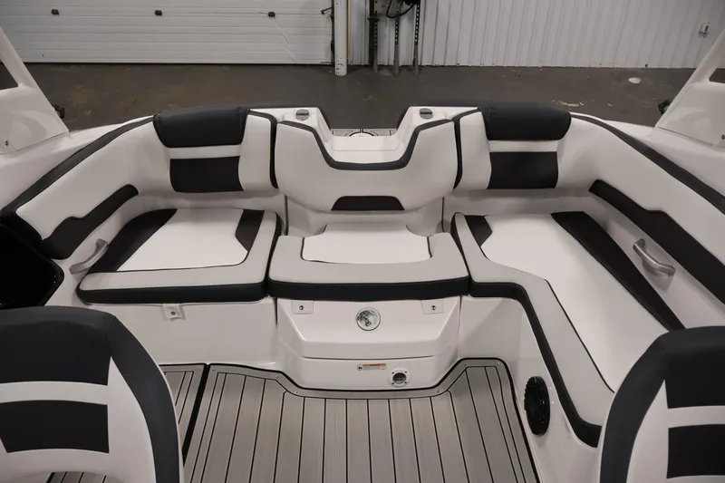 Slide: The Image of Interior seating of 2026 Yamaha Boats 195S, featuring sleek black and white upholstery. - 30