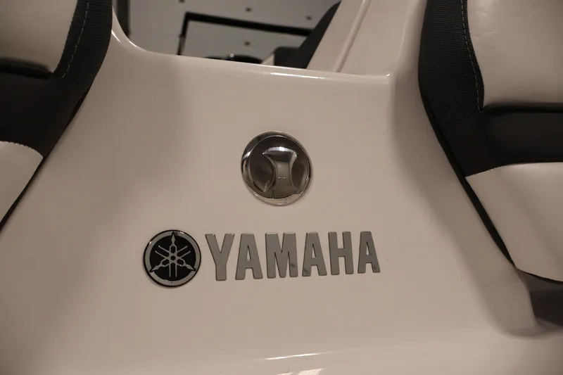 Slide: The Image of Close-up of 2026 Yamaha Boats 195S logo on white surface. - 34