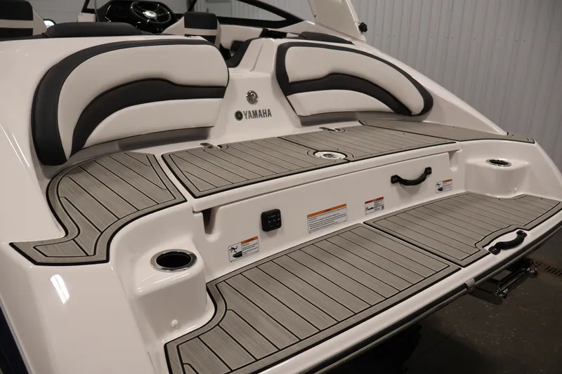 Slide: The Image of 2026 Yamaha Boats 195S swim platform with cushioned seating and sleek design. - 35