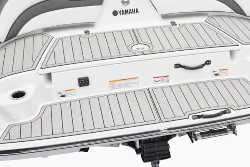 Slide: The Image of 2026 Yamaha Boats 195S swim platform with sleek design and integrated handles. - 42