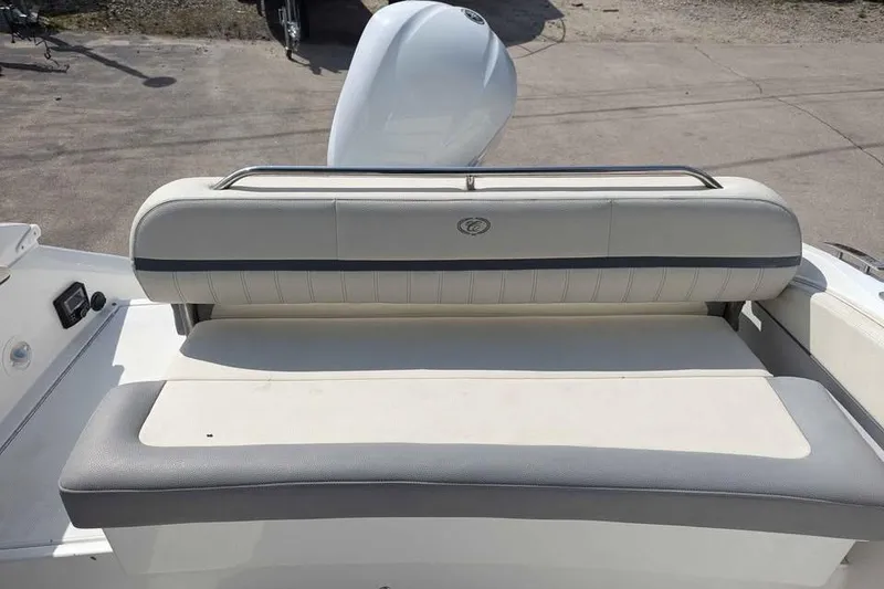 Slide: The Image of 2020 Cobalt 25SC boat seating area with cushioned backrest and sleek design. - 13