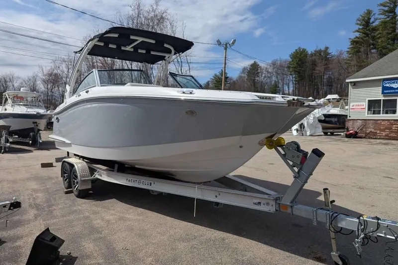 Slide: The Image of 2020 Cobalt 25SC boat on trailer in outdoor setting. - 5