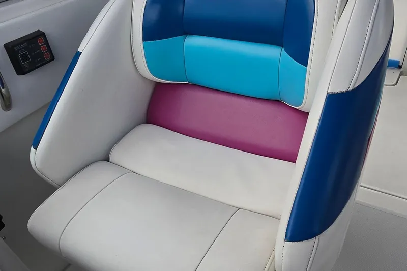 Slide: The Image of Colorful seat on 1995 Formula 34 Performance Cruiser boat. - 14
