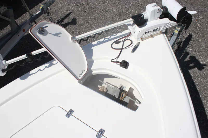 Slide: The Image of 2023 Sea Pro 228 Bay boat with Minn Kota trolling motor on deck. - 11