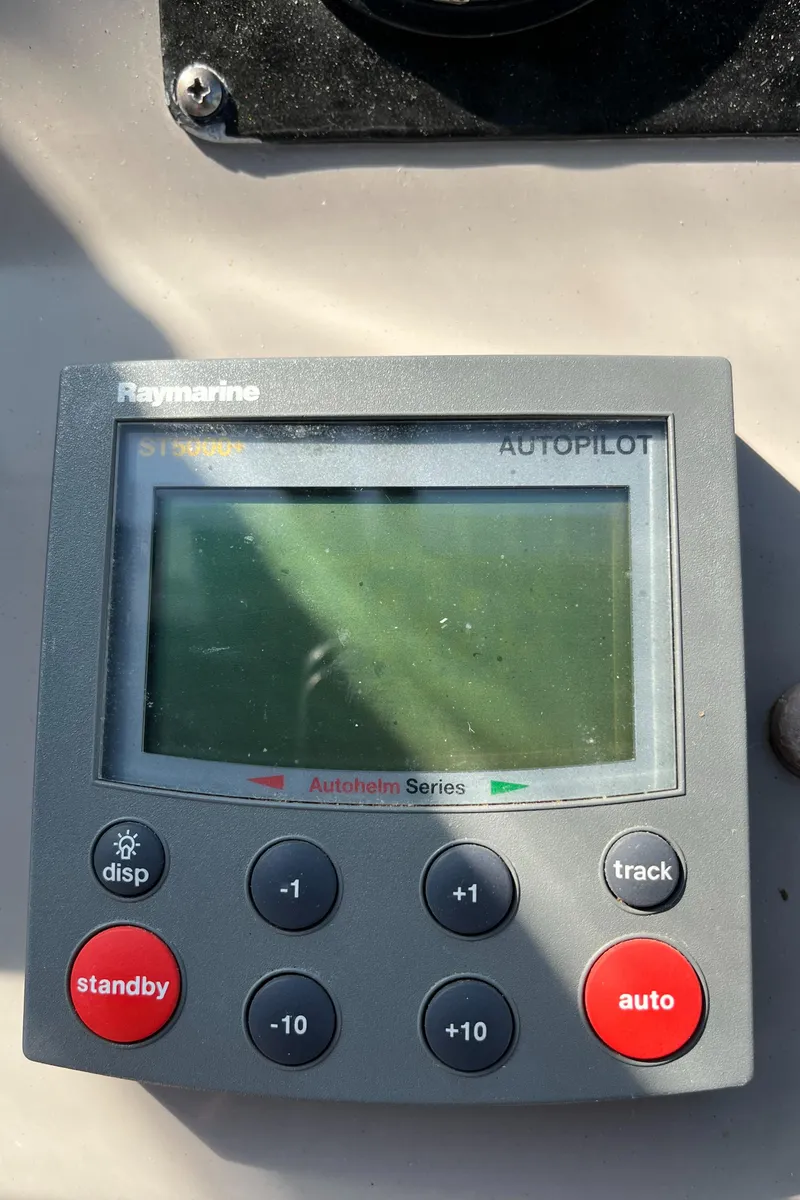 Slide: The Image of Raymarine autopilot control panel on 2001 Cruisers Yachts 2870 Express. - 25