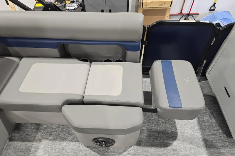 Slide: The Image of Premier 250 Sunsation RS 2025 boat interior with gray and blue seating arrangement. - 20