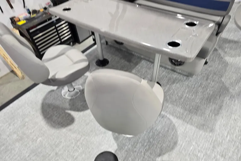 Slide: The Image of 2025 Premier 250 Sunsation RS interior with seating and table setup. - 24