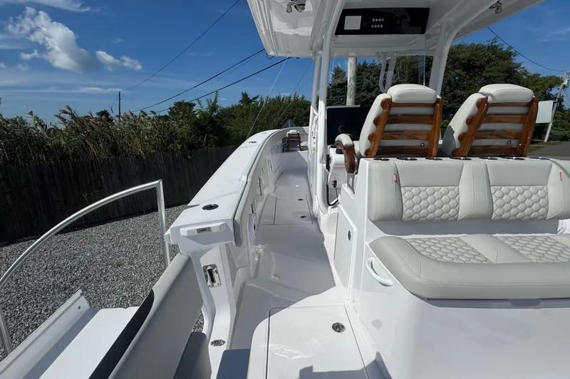 Slide: The Image of 2026 Jupiter 34 boat interior with luxurious seating and modern design. - 21