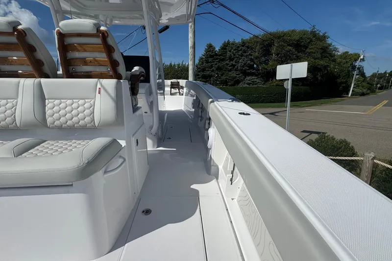 Slide: The Image of Luxurious interior of 2026 Jupiter 34 boat with plush seating and sleek design. - 25