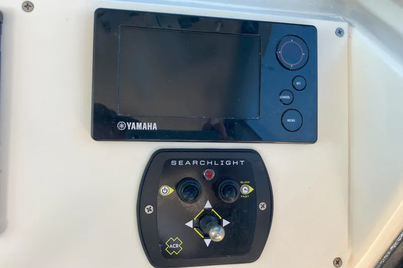 Slide: The Image of Yamaha control panel and searchlight interface on 2001 Parker 2520 Sport Cabin boat. - 20
