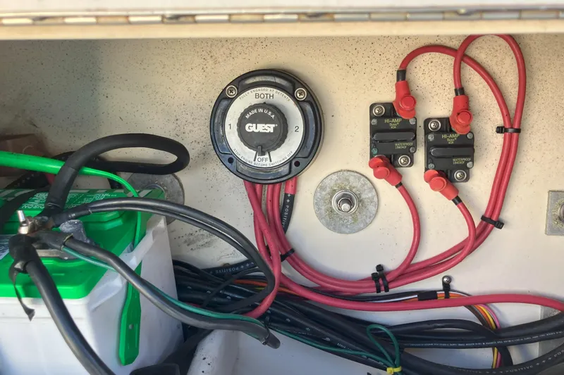 Slide: The Image of Electrical system of a 2001 Parker 2520 Sport Cabin boat, featuring battery switch and wiring. - 31