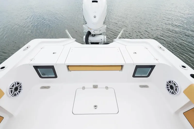 Slide: The Image of 2025 Sportsman Masters 267OE Bay Boat interior with cushioned seating and sleek design. - 8