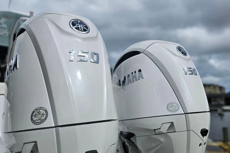 Slide: The Image of Twin Yamaha 150 outboard engines on 2026 Sea Hunt Ultra 265 SE boat. - 2