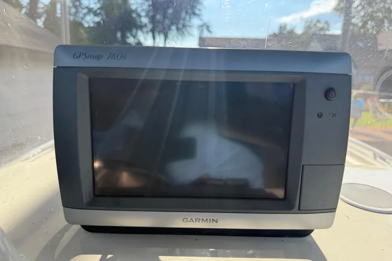 Slide: The Image of Garmin GPSmap 740s on 1995 Wellcraft Scarab Sport 302 boat dashboard. - 25