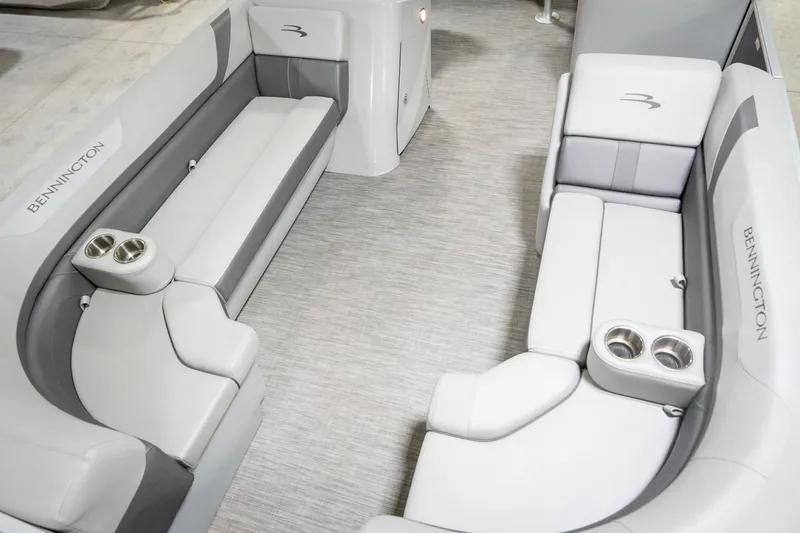 Slide: The Image of 2021 Bennington 21 SLX pontoon boat in indoor showroom on trailer. - 12