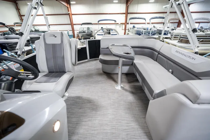 Slide: The Image of 2021 Bennington 21 SLX pontoon boat interior with spacious seating and modern design. - 17