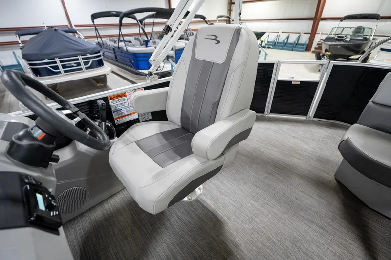 Slide: The Image of Captain's chair in 2021 Bennington 21 SLX pontoon boat, showroom display. - 27