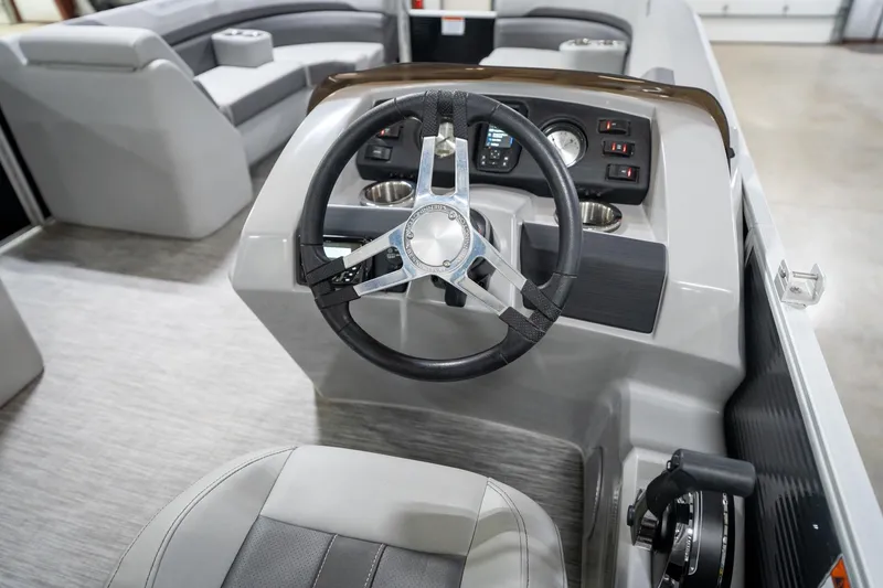 Slide: The Image of Interior of a 2021 Bennington 21 SLX pontoon boat with gray seating. - 33