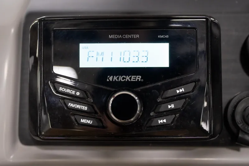 Slide: The Image of Close-up of Bennington 21 SLX 2021 steering wheel with logo and Reeder-Trausch Marine contact. - 36