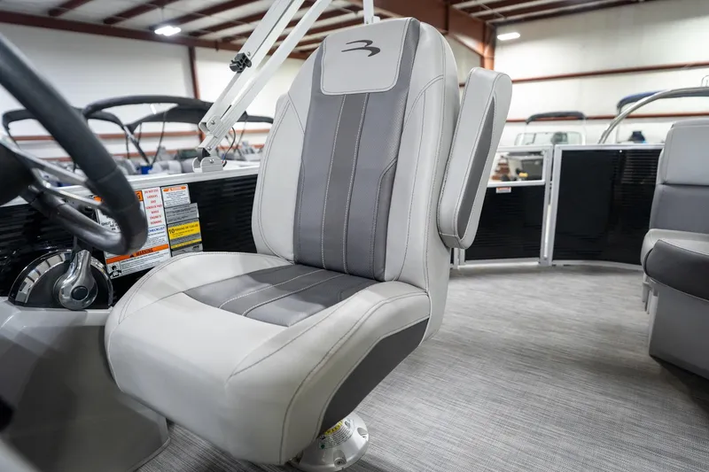 Slide: The Image of Throttle control and warning labels on 2021 Bennington 21 SLX boat dashboard. - 43