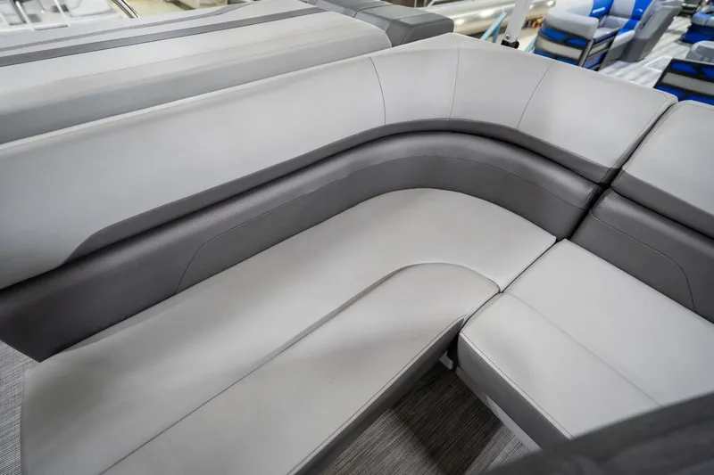 Slide: The Image of Close-up of 2021 Bennington 21 SLX boat seat with logo and Reeder-Trausch Marine contact. - 45