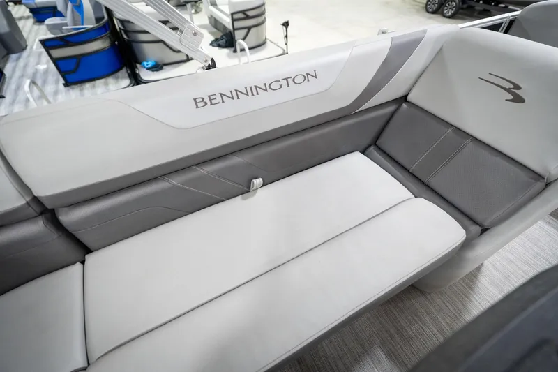 Slide: The Image of 2021 Bennington 21 SLX boat interior with gray seating, showcased by Reeder Trausch Marine. - 46