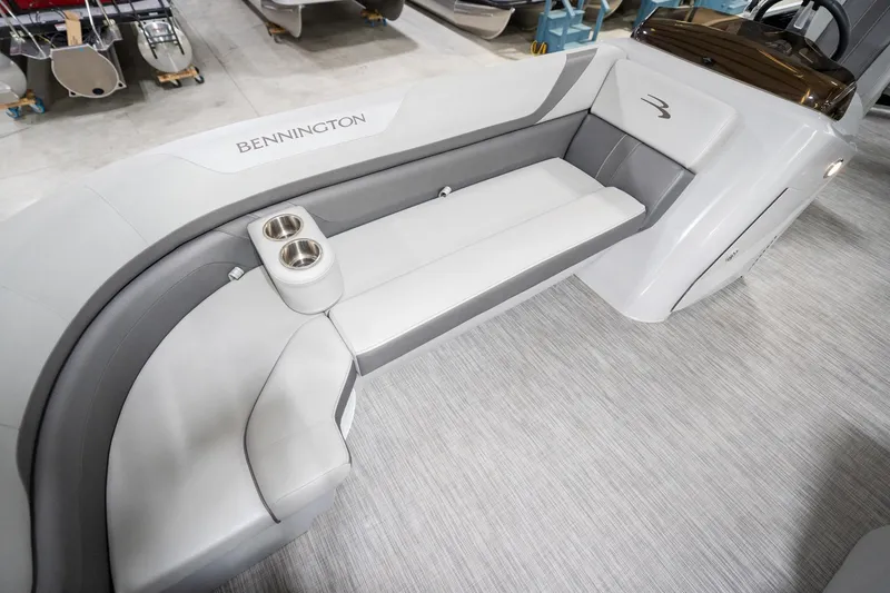 Slide: The Image of 2021 Bennington 21 SLX boat interior with gray seating, showcased at Reeder Trausch Marine. - 47