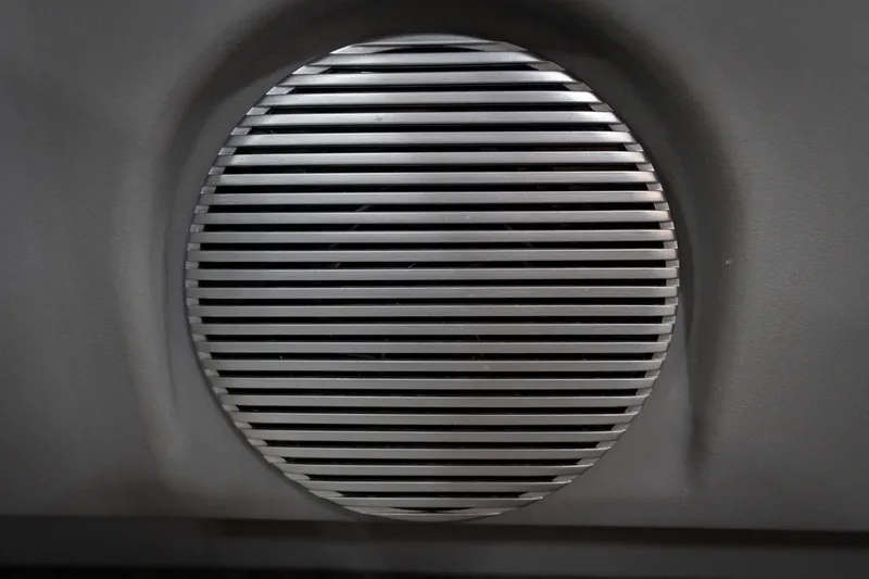 Slide: The Image of 2021 Bennington 21 SLX boat interior with gray seating and cup holders. - 48