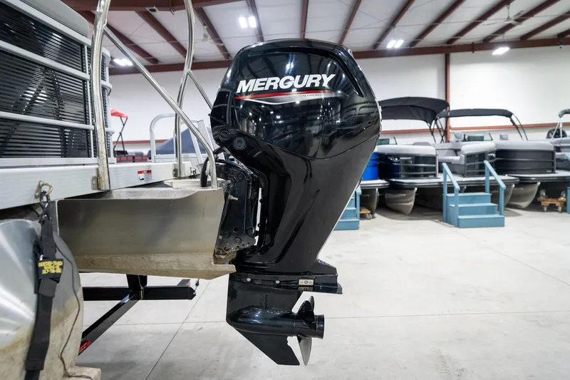 Slide: The Image of 2021 Bennington 21 SLX boat interior flooring with Reeder-Trausch Marine logo. - 51