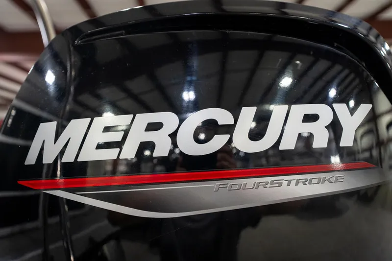 Slide: The Image of 2021 Bennington 21 SLX with Mercury outboard motor in showroom. - 52