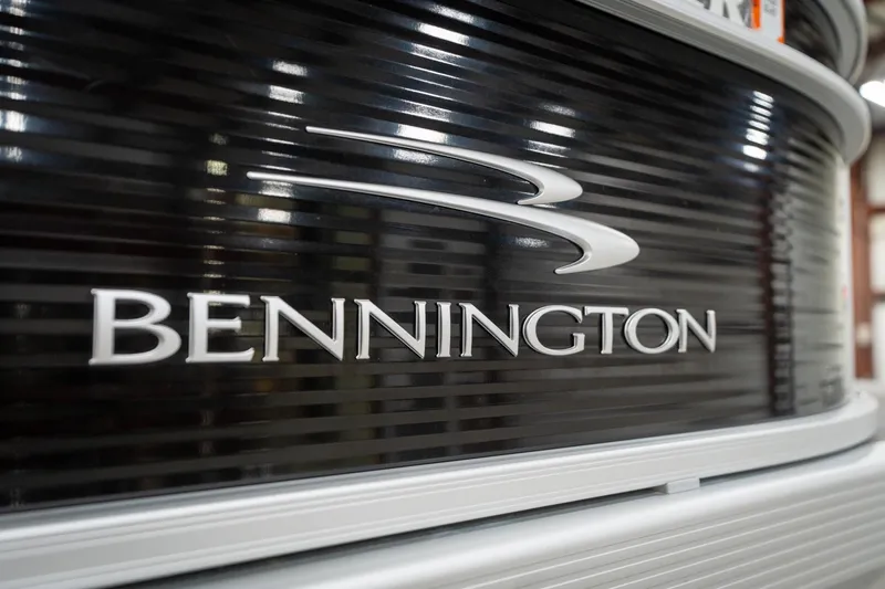 Slide: The Image of 2021 Bennington 21 SLX logo on sleek black panel, Reeder-Trausch Marine contact details visible. - 57