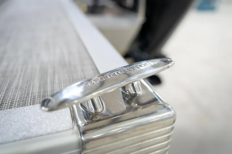 Slide: The Image of 2021 Bennington 21 SLX pontoon boat on trailer in indoor storage facility. - 63