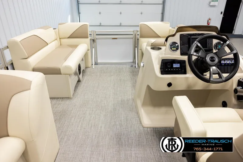 Slide: The Image of Interior of 2026 Avalon VEN CRB boat with beige seating and modern dashboard. - 17