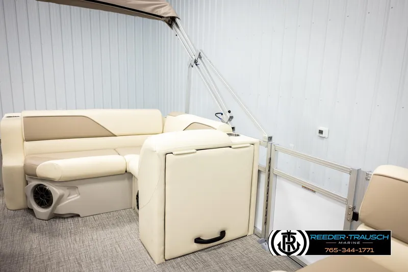 Slide: The Image of 2026 Avalon VEN CRB boat interior with beige seating and modern design. - 24