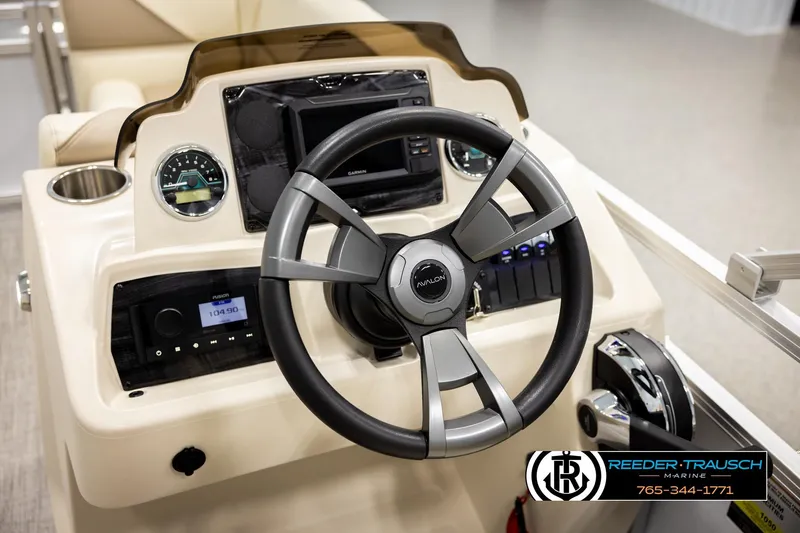 Slide: The Image of 2026 Avalon VEN CRB boat dashboard with steering wheel and control panel. - 27