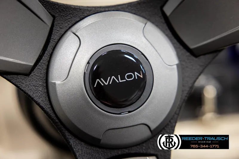 Slide: The Image of Close-up of 2026 Avalon VEN CRB steering wheel with logo, Reeder-Trausch Marine branding. - 28