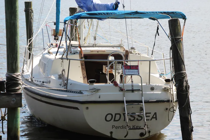 Slide: The Image of 1980 Watkins MONOHULL sailboat "ODYSSEA" docked, for sale sign visible. - 6