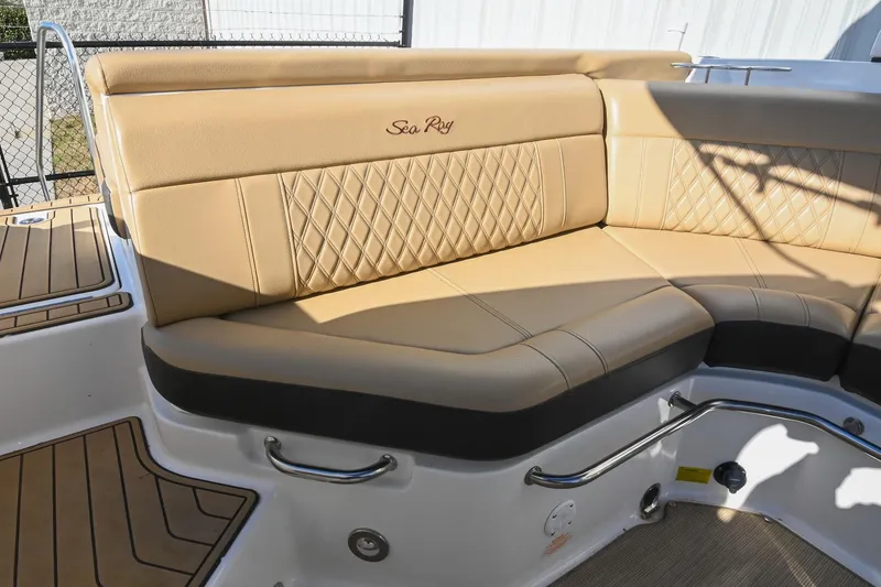 Slide: The Image of Luxurious tan seating on 2020 Sea Ray SLX 250 boat, featuring diamond stitching and sleek design. - 18