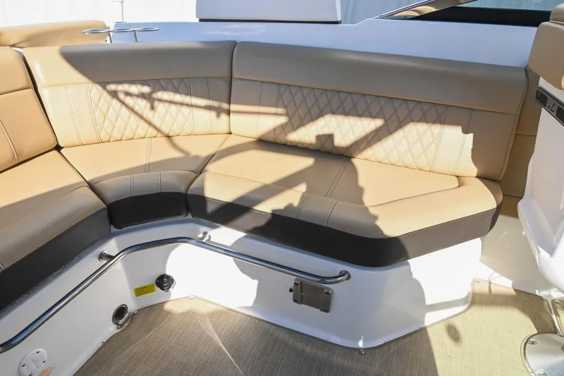 Slide: The Image of Luxurious tan seating on 2020 Sea Ray SLX 250 boat interior. - 20