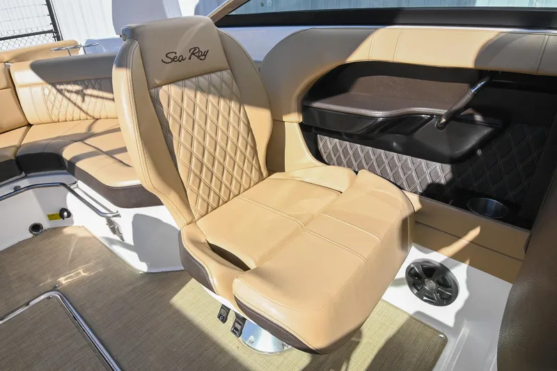 Slide: The Image of Luxurious tan seating in 2020 Sea Ray SLX 250 boat interior. - 27